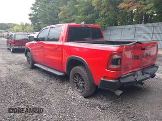 2021 Ram 1500 Rebel with VIN 1C6SRFLT2MN591844, listed as a IAAI auction lot 40410248 with 84,759 mi miles and . Bid and sale history available at DreamBid. Image 3.