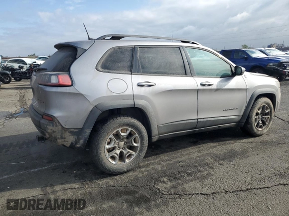 2019 Jeep Cherokee Trailhawk with VIN 1C4PJMBX8KD314746, listed as a Copart auction lot 51801135 with 124,281 mi miles and Salvage title. Bid and sale history available at DreamBid. Image 3.