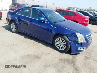 2012 Cadillac CTS Luxury with VIN 1G6DE5E59C0102621, listed as a IAAI auction lot 42554121 with 128,430 mi miles and . Bid and sale history available at DreamBid. Image 1.