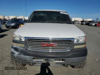 2002 GMC Sierra 2500HD SLE z VIN 1GTHC24G22E267031, wystawiony jako Copart lot #58606335 z przebiegiem Nie podano mil oraz Szkoda całkowita • Salvage title. Historia ofert i sprzedaży dostępna na DreamBid. Obrazek 5.