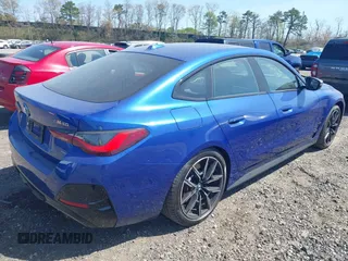 2024 BMW i4 M50 z VIN WBY33AW09RFS60679, wystawiony jako IAAI lot #41983706 z przebiegiem 2665 mil mil oraz . Historia ofert i sprzedaży dostępna na DreamBid. Obrazek 4.
