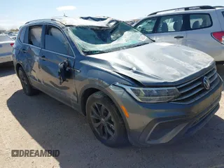 2023 Volkswagen Tiguan SE with VIN 3VV3B7AX5PM018742, listed as a IAAI auction lot 41762506 with 19,355 mi miles and . Bid and sale history available at DreamBid. Image 1.