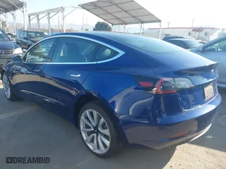 2019 Tesla Model 3 Long Range with VIN 5YJ3E1EB3KF497841, listed as a IAAI auction lot 41969728 with 21,127 mi miles. Bid and sale history available at carsss.com. Image 3.