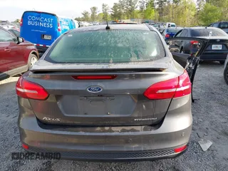 2016 Ford Focus Titanium with VIN 1FADP3J25GL282293, listed as a IAAI auction lot 41998959 with 119,781 mi miles and . Bid and sale history available at DreamBid. Image 16.