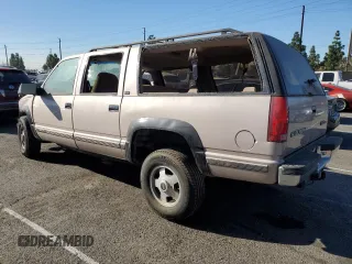 1993 GMC Suburban z VIN 1GKGK26NXPJ711771, wystawiony jako Copart lot #85515174 z przebiegiem 63 064 mil mil oraz Szkoda całkowita • Salvage title. Historia ofert i sprzedaży dostępna na DreamBid. Obrazek 2.