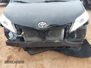 2012 Toyota Sienna XLE with VIN 5TDDK3DC3CS030466, listed as a IAAI auction lot 41914368 with 174,512 mi miles. Bid and sale history available at carsss.com. Image 6.