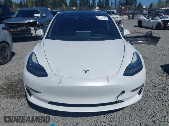 2018 Tesla Model 3 Long Range Battery with VIN 5YJ3E1EA7JF020173, listed as a IAAI auction lot 42046312 with 83,395 mi miles and . Bid and sale history available at DreamBid. Image 13.