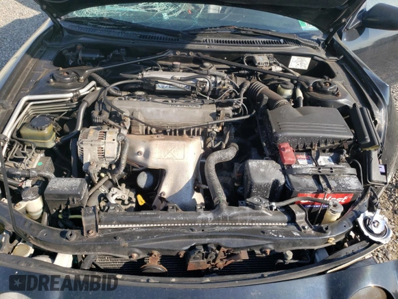 1997 Toyota Celica GT z VIN JT5FG02T2V0044842, wystawiony jako Copart lot #54335965 z przebiegiem 203 152 mil mil oraz Szkoda całkowita • Salvage title. Historia ofert i sprzedaży dostępna na DreamBid. Obrazek 11.