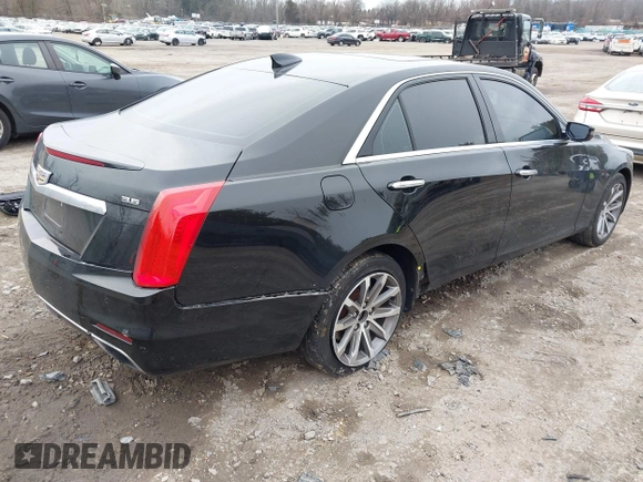 2016 Cadillac CTS Luxury Collection AWD with VIN 1G6AX5SS9G0194228, listed as a IAAI auction lot 41504476 with 94,573 mi miles and . Bid and sale history available at DreamBid. Image 4.
