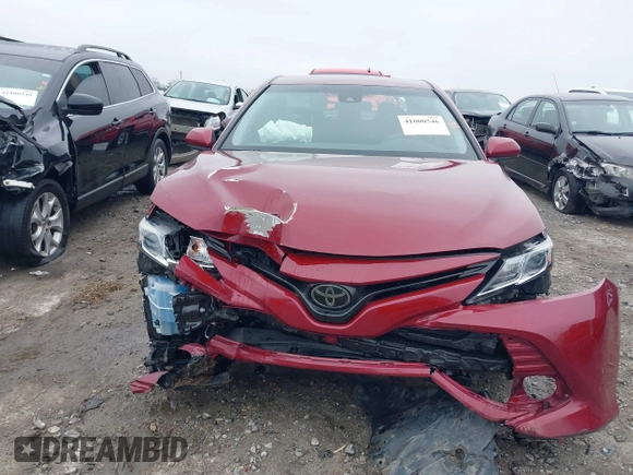 2020 Toyota Camry LE with VIN 4T1C11AK1LU359477, listed as a IAAI auction lot 41800546 with 109,319 mi miles and . Bid and sale history available at DreamBid. Image 6.