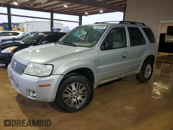 2005 Mercury Mariner Luxury z VIN 4M2YU561X5DJ04364, wystawiony jako Copart lot #44622345 z przebiegiem 265 744 mil mil oraz Szkody całkowita. Historia ofert i sprzedaży dostępna na DreamBid. Obrazek 1.