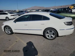 2014 Volkswagen CC Sport with VIN WVWBN7AN7EE501362, listed as a Copart auction lot 73544044 with 228,140 mi miles and Salvage Title. Bid and sale history available at carsss.com. Image 2.