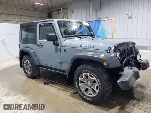 2014 Jeep Wrangler Sport with VIN 1C4AJWAG9EL322982, listed as a Copart auction lot 51145075 with 122,686 mi miles and Salvage Title. Bid and sale history available at DreamBid. Image 4.