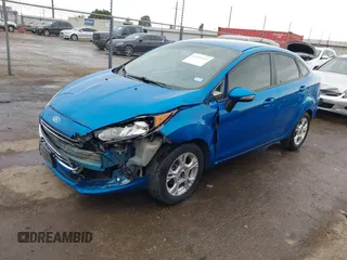2016 Ford Fiesta SE with VIN 3FADP4BJXGM156859, listed as a IAAI auction lot 42119154 with 74,157 mi miles and . Bid and sale history available at DreamBid. Image 18.