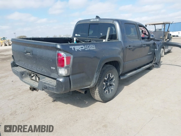 2021 Toyota Tacoma 4WD SR with VIN 3TMCZ5AN4MM387519, listed as a IAAI auction lot 41769922 with 61,813 mi miles. Bid and sale history available at carsss.com. Image 4.