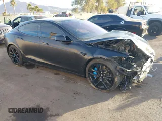 2022 Tesla Model S with VIN 5YJSA1E57NF493457, listed as a IAAI auction lot 41456284 with Not Provided miles and . Bid and sale history available at DreamBid. Image 1.