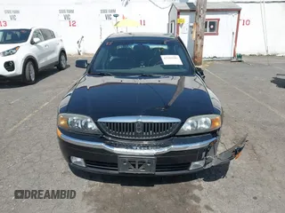 2001 Lincoln LS z VIN 1LNHM86S71Y620289, wystawiony jako IAAI lot #42105386 z przebiegiem 74 148 mil mil oraz . Historia ofert i sprzedaży dostępna na DreamBid. Obrazek 12.