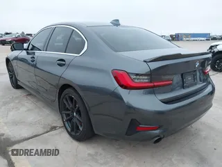 2021 BMW 3 Series 330i with VIN 3MW5R1J09M8C15403, listed as a IAAI auction lot 41892341 with 30,975 mi miles and . Bid and sale history available at carsss.com. Image 3.