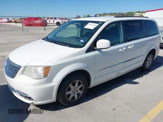 2012 Chrysler Town & Country Touring with VIN 2C4RC1BG7CR308985, listed as a IAAI auction lot 42015578 with 196,604 mi miles. Bid and sale history available at carsss.com. Image 2.