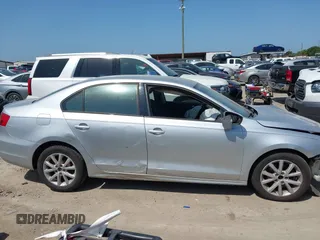 2012 Volkswagen Jetta SE with VIN 3VWBP7AJXCM340937, listed as a IAAI auction lot 42526373 with 157,113 mi miles and . Bid and sale history available at DreamBid. Image 12.