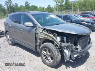 2017 Hyundai Santa Fe 2.4L z VIN 5NMZU3LB3HH031040, wystawiony jako IAAI lot #42274509 z przebiegiem 101 865 mil mil oraz . Historia ofert i sprzedaży dostępna na DreamBid. Obrazek 1.