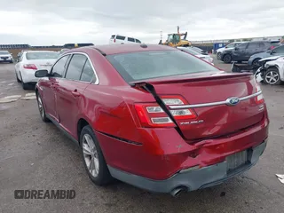 2015 Ford Taurus SEL with VIN 1FAHP2E8XFG137526, listed as a IAAI auction lot 41909658 with 147,992 mi miles and . Bid and sale history available at carsss.com. Image 6.