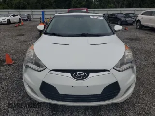 2012 Hyundai Veloster w/Black Int z VIN KMHTC6AD1CU030478, wystawiony jako Copart lot #62715005 z przebiegiem 127 625 mil mil oraz Szkoda całkowita • Salvage title. Historia ofert i sprzedaży dostępna na DreamBid. Obrazek 5.