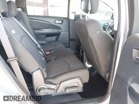 2017 Dodge Journey SE with VIN 3C4PDCABXHT586922, listed as a IAAI auction lot 41711047 with 114,118 mi miles and . Bid and sale history available at DreamBid. Image 8.