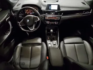 2018 BMW X1 xDrive28i with VIN WBXHT3C30J5K29917, listed as a Copart auction lot 56165845 with 131,876 mi miles and Salvage title. Bid and sale history available at DreamBid. Image 8.