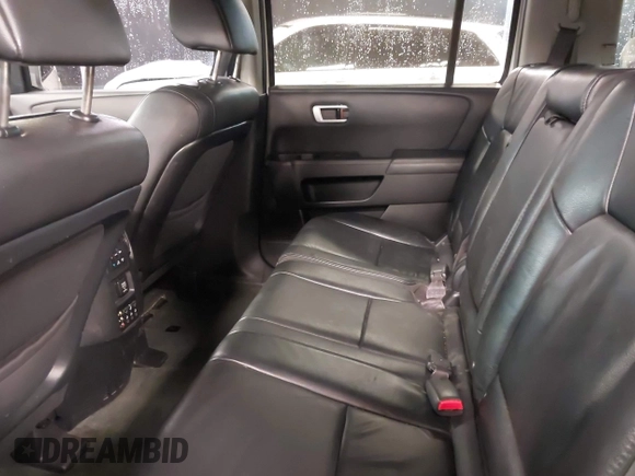 2015 Honda Pilot Touring with VIN 5FNYF4H98FB001841, listed as a IAAI auction lot 41955645 with 109,818 mi miles. Bid and sale history available at carsss.com. Image 8.