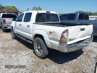 2013 Toyota Tacoma with VIN 5TFLU4EN0DX071533, listed as a IAAI auction lot 42050609 with 204,624 mi miles and . Bid and sale history available at DreamBid. Image 3.
