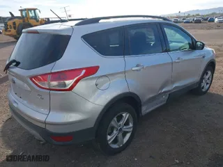 2014 Ford Escape SE with VIN 1FMCU9GX6EUB20308, listed as a IAAI auction lot 41818794 with 141,587 mi miles. Bid and sale history available at carsss.com. Image 4.