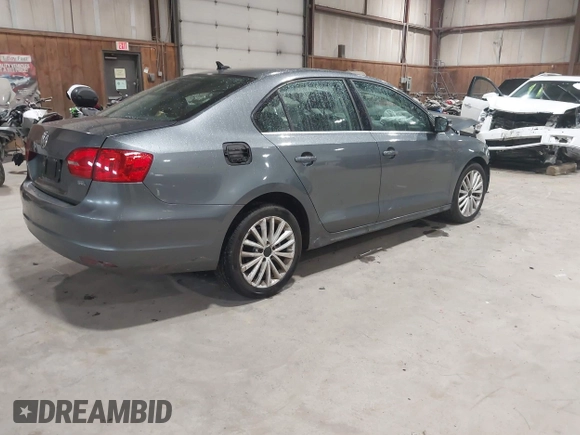 2014 Volkswagen Jetta SEL с VIN 3VWL17AJ6EM372759, выставлен на аукционе IAAI как лот 42305046 с пробегом 99 645 миль миль и . История ставок и продаж доступна на DreamBid. Изображение 4.