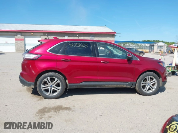 2015 Ford Edge Titanium z VIN 2FMTK3K87FBB46832, wystawiony jako IAAI lot #42358523 z przebiegiem 107 076 mil mil oraz . Historia ofert i sprzedaży dostępna na DreamBid. Obrazek 13.