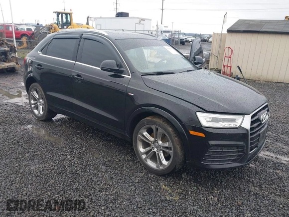 2018 Audi Q3 Premium Plus with VIN WA1JCCFS5JR014957, listed as a IAAI auction lot 41099133 with 73,905 mi miles. Bid and sale history available at carsss.com. Image 1.