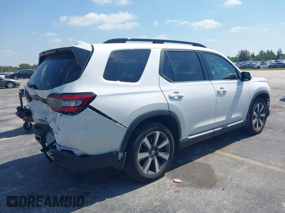 2024 Honda Pilot Touring z VIN 5FNYG2H72RB016937, wystawiony jako IAAI lot #42137854 z przebiegiem 18 028 mil mil oraz . Historia ofert i sprzedaży dostępna na DreamBid. Obrazek 4.