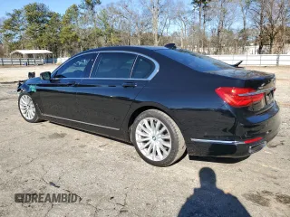 2017 BMW 7 Series 740i xDrive with VIN WBA7E4C5XHGU99338, listed as a Copart auction lot 39952414 with 51,938 mi miles. Bid and sale history available at carsss.com. Image 2.