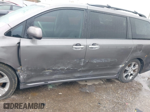 2014 Toyota Sienna SE with VIN 5TDXK3DC4ES434604, listed as a IAAI auction lot 41346434 with 108,633 mi miles and . Bid and sale history available at DreamBid. Image 6.