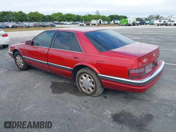 1995 Cadillac Seville Luxury SLS with VIN 1G6KS52Y7SU833943, listed as a IAAI auction lot 40873559 with 1 mi miles. Bid and sale history available at carsss.com. Image 3.