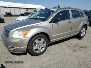 2009 Dodge Caliber SXT z VIN 1B3HB48A19D199410, wystawiony jako Copart lot #55133965 z przebiegiem 141 658 mil mil oraz Szkoda całkowita • Salvage title. Historia ofert i sprzedaży dostępna na DreamBid. Obrazek 1.