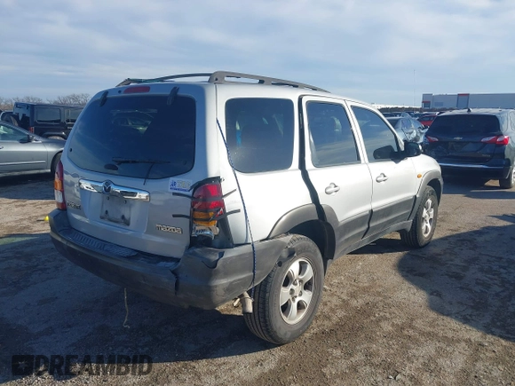 2003 Mazda Tribute LX with VIN 4F2YZ04183KM44733, listed as a IAAI auction lot 41472662 with 246,522 mi miles and . Bid and sale history available at DreamBid. Image 4.