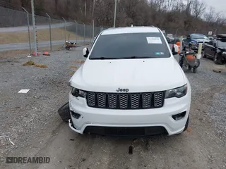 2018 Jeep Grand Cherokee Laredo E with VIN 1C4RJFAG6JC152867, listed as a IAAI auction lot 41486884 with 67,115 mi miles. Bid and sale history available at carsss.com. Image 12.