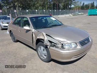 2001 Toyota Camry CE with VIN JT2BG22K910581703, listed as a IAAI auction lot 42020085 with 107,035 mi miles. Bid and sale history available at carsss.com. Image 1.