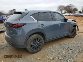 2023 Mazda CX-5 S Carbon Edition with VIN JM3KFBCM9P0280049, listed as a Copart auction lot 85712024 with 13,694 mi miles and Salvage Title. Bid and sale history available at DreamBid. Image 3.