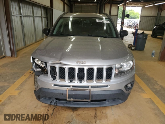 2016 Jeep Compass Sport z VIN 1C4NJCBA9GD810594, wystawiony jako Copart lot #56961885 z przebiegiem 151 386 mil mil oraz Szkoda całkowita • Salvage title. Historia ofert i sprzedaży dostępna na DreamBid. Obrazek 5.