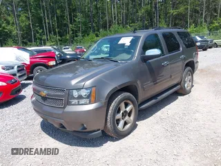 2012 Chevrolet Tahoe LT with VIN 1GNSCBE09CR229417, listed as a IAAI auction lot 42507793 with 164,877 mi miles and . Bid and sale history available at DreamBid. Image 2.