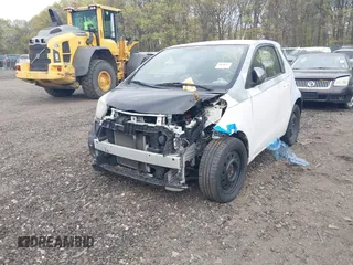 2013 Scion iQ with VIN JTNJJXB06DJ022801, listed as a IAAI auction lot 42152740 with Not provided miles and . Bid and sale history available at DreamBid. Image 2.