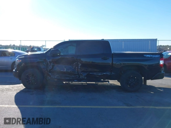 2021 Toyota Tundra SR5 with VIN 5TFDY5F13MX005925, listed as a IAAI auction lot 41352132 with 57,470 mi miles and . Bid and sale history available at DreamBid. Image 14.