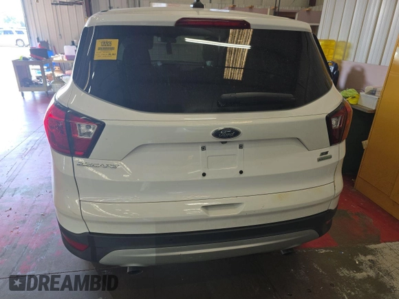 2019 Ford Escape SE z VIN 1FMCU0GD5KUC07713, wystawiony jako IAAI lot #42524778 z przebiegiem 86 392 mil mil oraz . Historia ofert i sprzedaży dostępna na DreamBid. Obrazek 15.