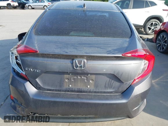 2017 Honda Civic EX z VIN 19XFC2F7XHE056273, wystawiony jako IAAI lot #42087934 z przebiegiem 95 871 mil mil oraz . Historia ofert i sprzedaży dostępna na DreamBid. Obrazek 17.